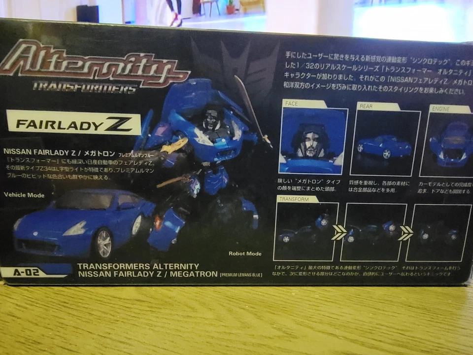 Transformers Alternity MEGATRON Fairlady Z versión AZUL NRFB Foto 3 de 4