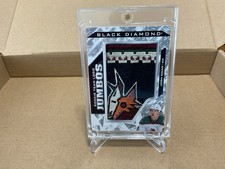 Hockey 2024-25 BLACK DIAMOND ROOKIE TEAM LOGO JUMBO