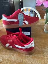 womens Reeboks 8 1/2 size red orange and whit...