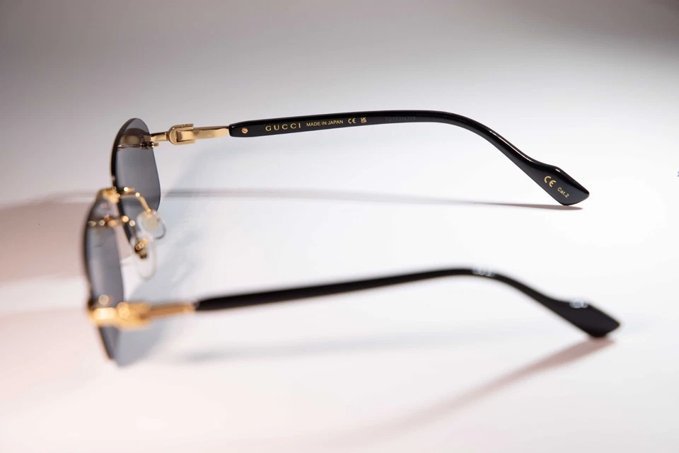 Gucci GG1221S 001 Gold-Black/Grey Rectangular Narrow Rimless Men's Sunglasses - Image 2 of 4