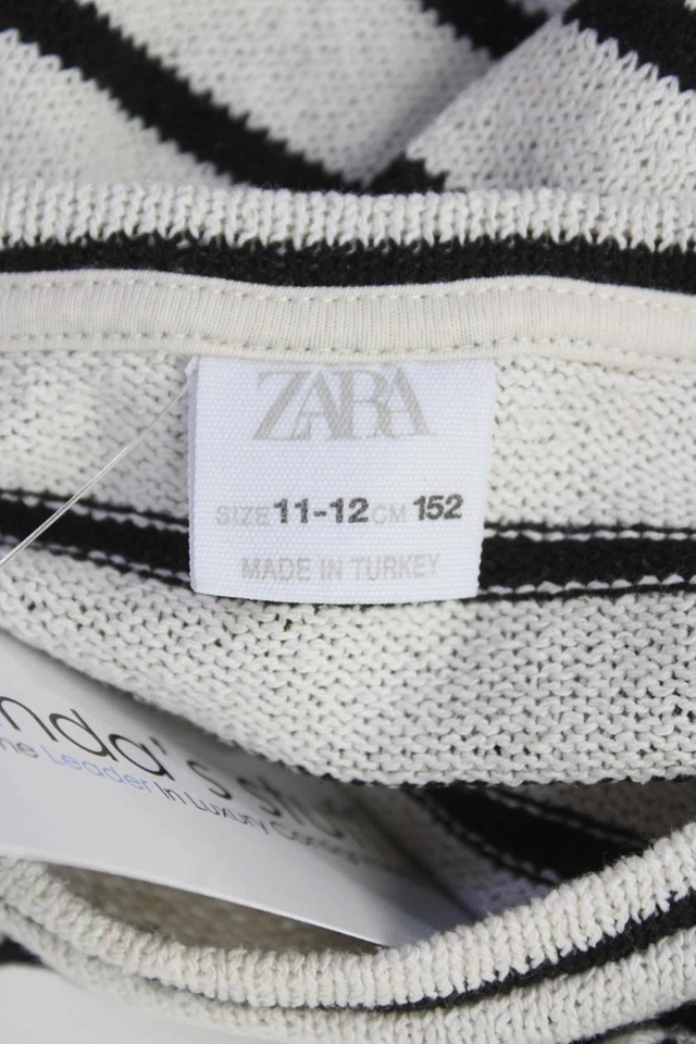 Top tejido a rayas con cuello redondo manga larga blanco talla 11-12 de Zara para niñas Foto 3 de 3
