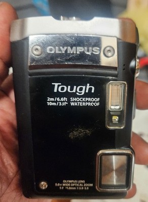 Olympus Stylus Tough TG-810 digital camera in black. Comes With Charging Cable