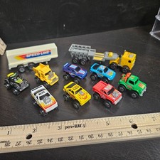 Lot 10 Vintage Micro Machines Diecast Cars Semi Dump Monster Trucks Road Champs