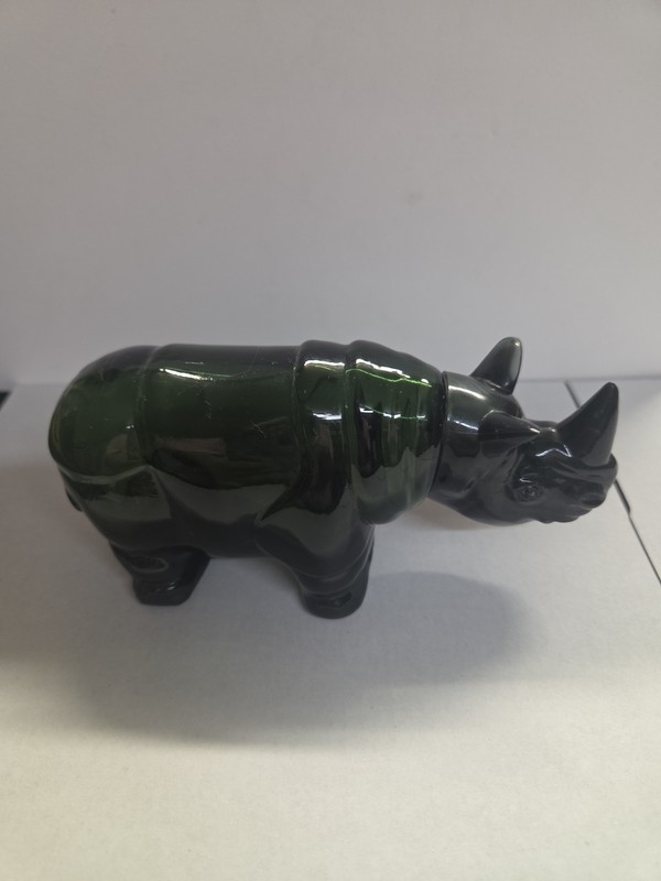 Avon Tai Winds After Shave Rhinoceros Figurine Bottle Dark Green Glass 4 fl oz