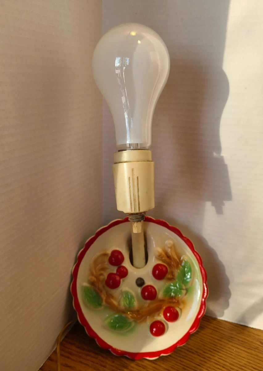 Red plug 2024 in wall sconce