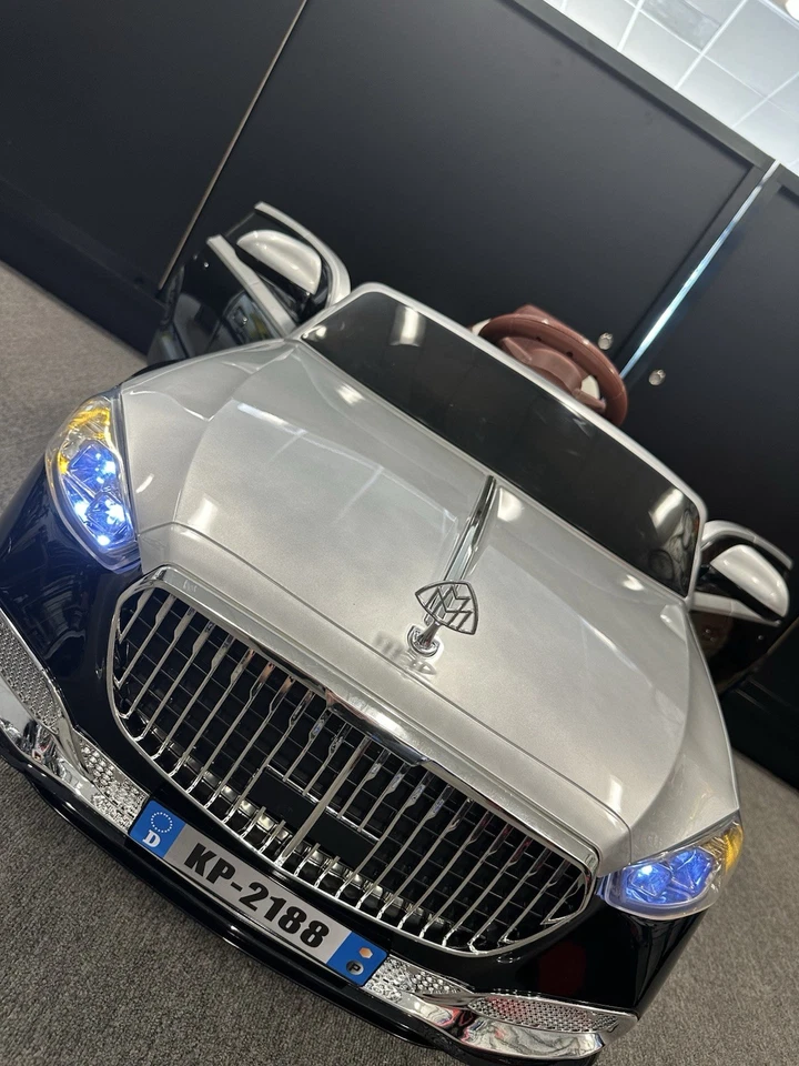 Nuevo coche de paseo con rueda eléctrica de 12 V para niños con control remoto Foto 2 de 4