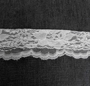 2.375 yards of 2" Ecru Pocket Lace with Traditional Pattern used for apparel