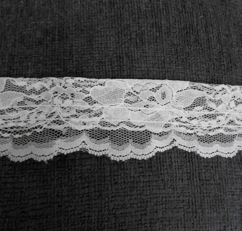 2.375 yards of 2" Ecru Pocket Lace with Traditional Pattern used for apparel