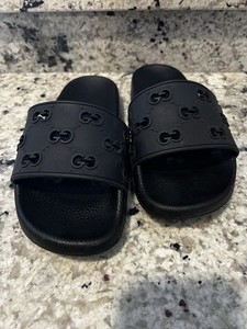 Women’s Black Gucci Rubber Monogram Slide Sandal. Size 5.