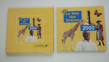 Le livre des timbres 2000 Hergé Tintin Tazieff Cousteau Saint-Exupéry Lune 1969 