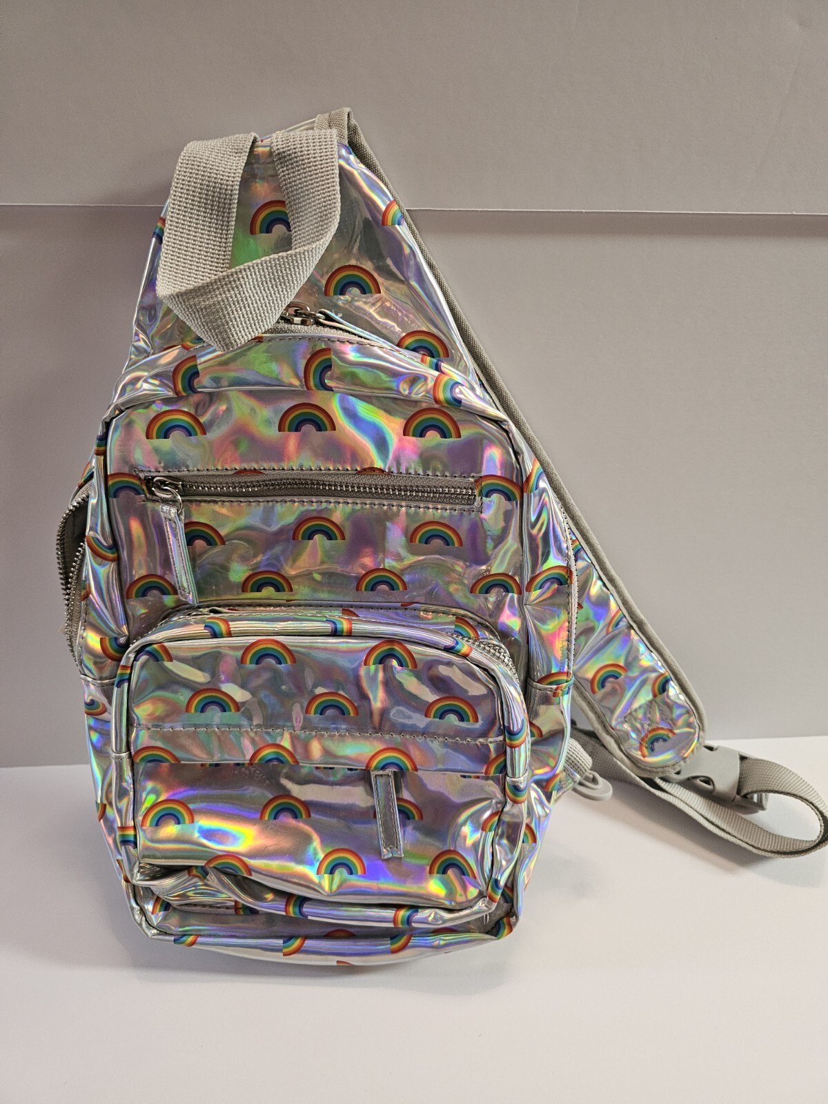 Silver Backpack With Rainbows - image 1