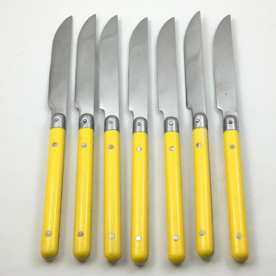 7 cuchillos Crown Corning de acero inoxidable de 8 3/4" Corea con mango de plástico amarillo cubiertos Foto 3 de 4