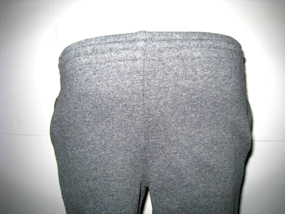 Pantalones deportivos Reebok grises elásticos/cordón cintura tobillo elásticos talla 8 para niños Foto 3 de 4