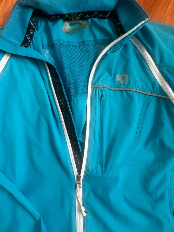 Chaqueta cortavientos PEARL IZUMI Elite Barrier empaquetable con caparazón de lluvia para mujer S azul Foto 4 de 4