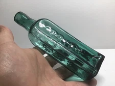 Antique Rich Teal C.W.S Grill Sauce Bottle. 6 7/8 Inches Tall.