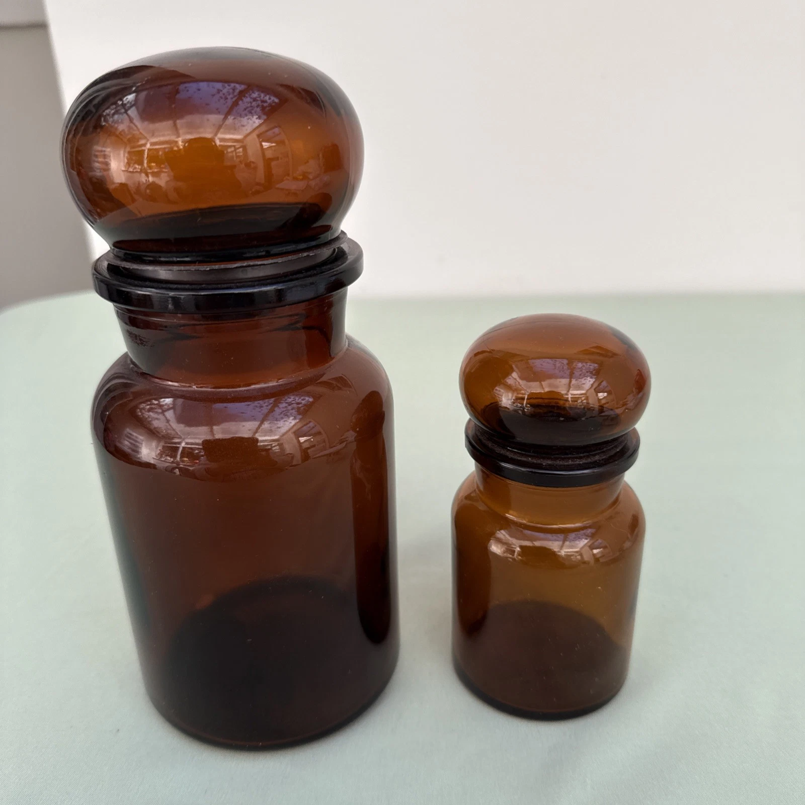 2 Vintage Amber Brown Glass Apothecary Jars With Bubble Lids. (B140)
Opens in a new window or tab
