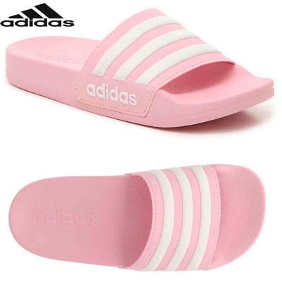 white and pink adidas slides