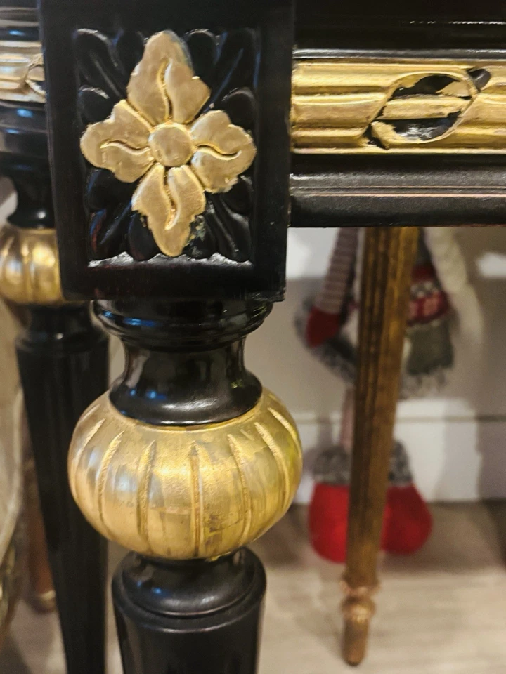 A black lacquered console table with marble top and gold gilt accents. - Image 4 of 4
