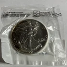 BU 1991-P Silver Eagle in Littleton Coin Company Packaging.