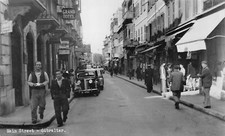 Gibraltar Main Street Cars Grand Hotel Remington Shops RPPC vintage postcard