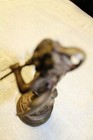 Vintage Brass 7.5" Flute Player with Swan on his back & head of swan on his head — photo 8