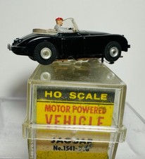 Aurora Vintage JAGUAR CONVERTIBLE BLACK W/TAN  CASE 1960  s HO Slot Car RUNS 