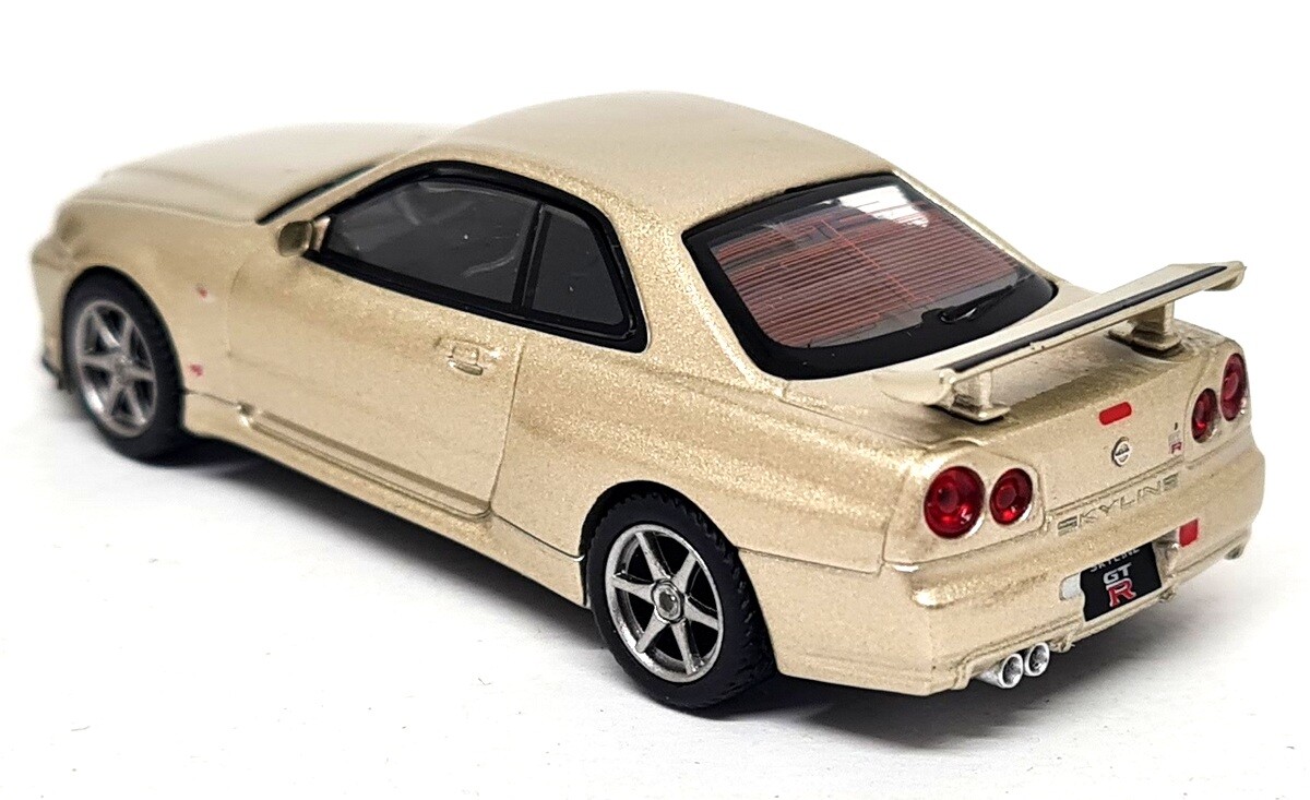 TSM 1/64 - Nissan Skyline GT-R R34 M-Spec Silica Breath RHD 348