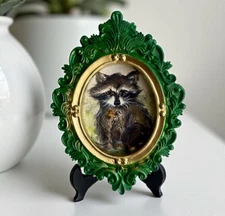 Raccoon holding Cookie mini watercolor print in vintage style ornate frame