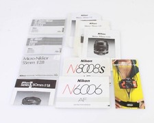 VINTAGE NIKON LENS MANUALS, LOT OF 10
