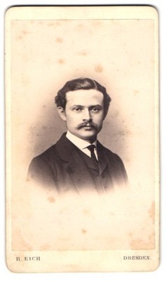Photograph R. Eich, Dresden, Pragerstr. 38, common man in black suit 