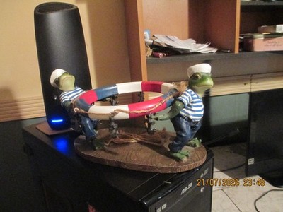 SAILOR FROGS CARRING A RED WHITE AND BLUE TUBE WOOD BASE