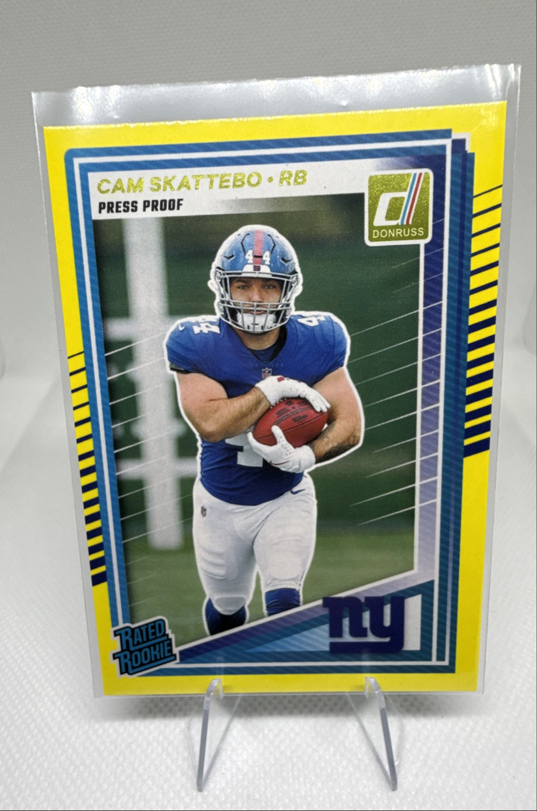 2025 Panini Donruss - Rated Rookie Cam Skattebo #302 Press Proof Yellow (RC)