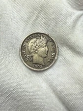 1902 O Barber Dime 10c Better Grade XF Reverse Cud T110