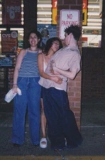 1990s Women CVS Storefront Fake Man Silly Kiss Funny Hugging No Parking Sign