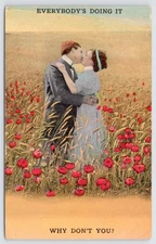 c1910 Romance Postcard- Man & Lady Kissing in Poppy Field- everybody’s doing it
