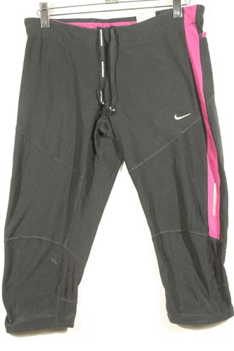 Leggings Nike neri Capri cropped taglia M rosa orlo corsa donna - Foto 1 di 8