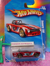 2010 i Hot Wheels TRIUMPH TR6 129  metallic Red;white/blue;FTE  Faster than Ever