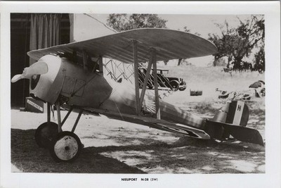 WW1 Nieuport 28 Fighter Photo with Car Parked on Grass Airfield