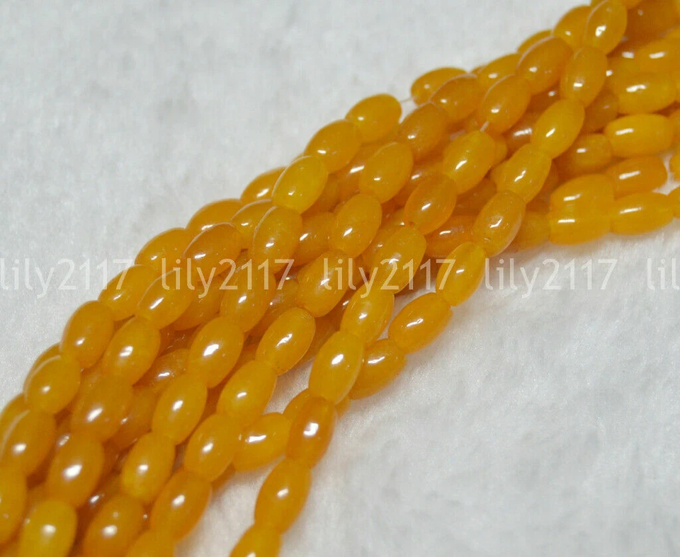 Venta al por mayor Cuentas sueltas amarillas de topacio natural de 5x8 mm con forma de arroz de 15" Foto 4 de 4