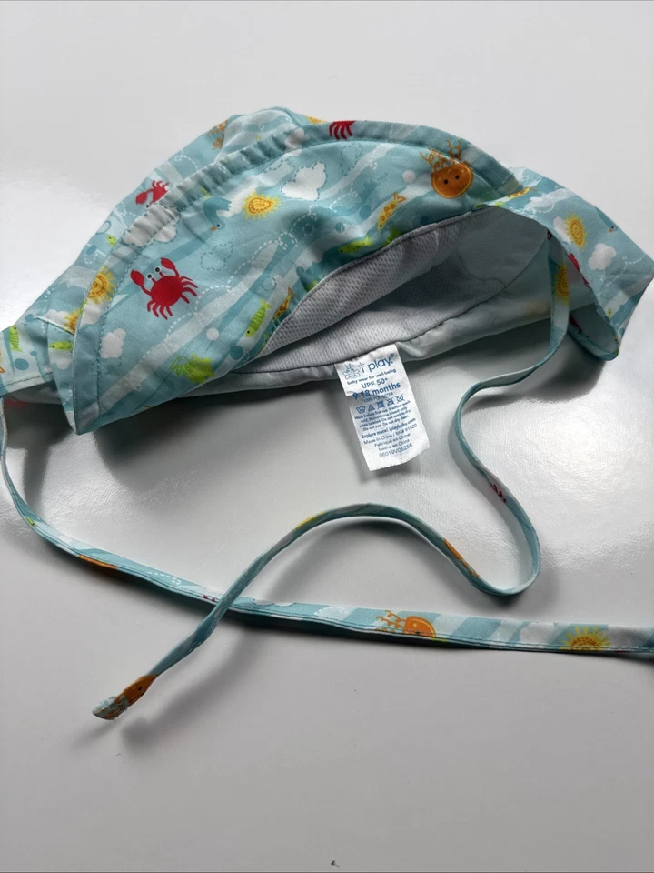 Sombrero para el sol bebé i play UPF 50+ estampado azul vida marina 9-18 meses correa ajustable Foto 3 de 4