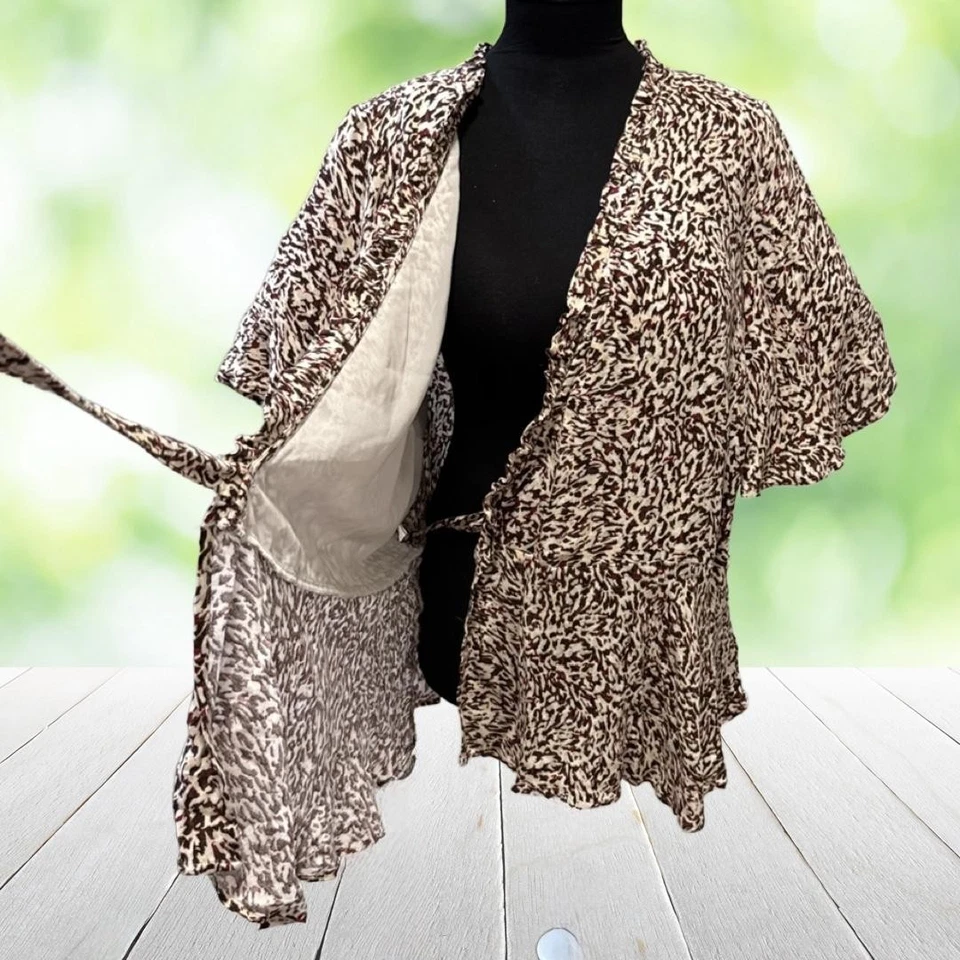 Top envolvente JESSICA SIMPSON talla 1X estampado animal peplum manga aleteada sobrepelliz nuevo con etiquetas Foto 4 de 4