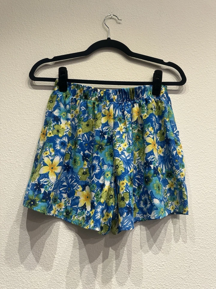 Pantalones cortos florales azules y amarillos Speechless niños talla L Foto 2 de 3