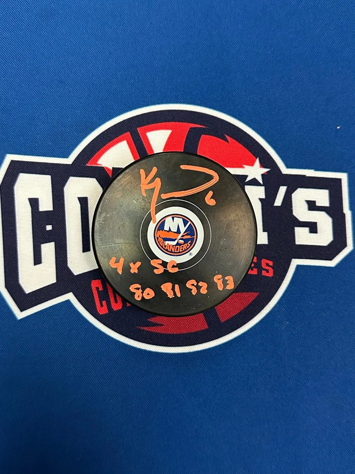 COACH'S COLLECTIBLES Ken Morrow Autographed NY Islanders Puck with 4x SC 80,81,82,83 Inscription (JSA