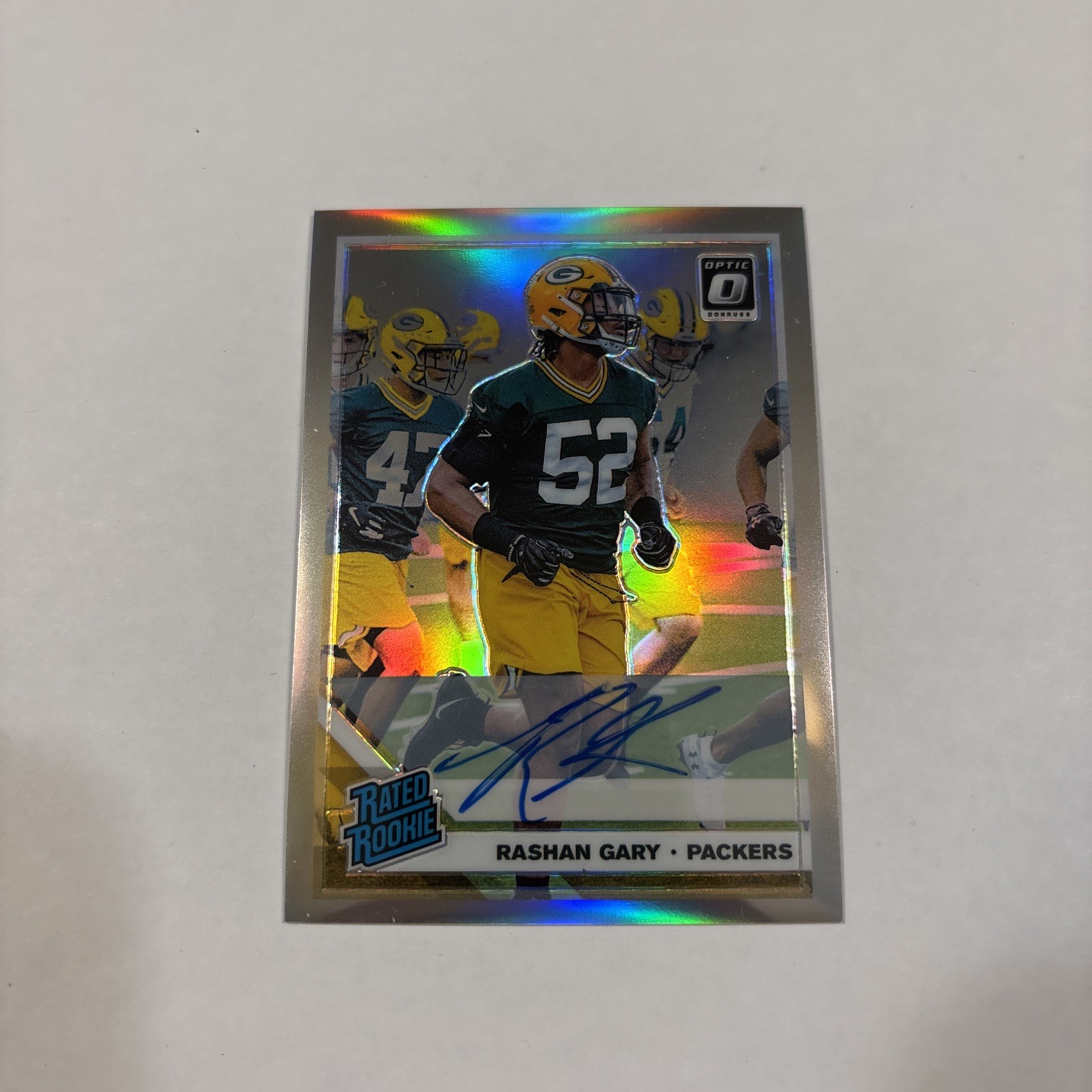 Rashan Gary 2019 Donruss Optic #195 RC Rated Rookie Silver Prizm Auto # /99 JP