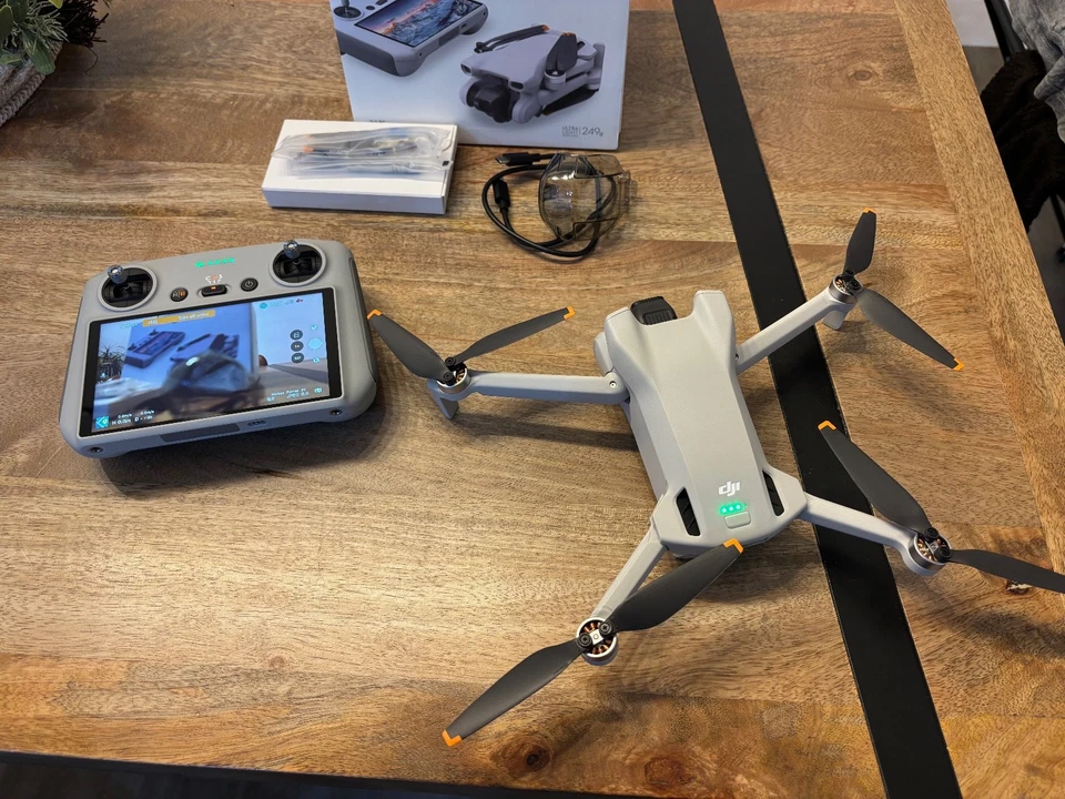 DJI Mini 3 with RC remote - immaculate, hovered once - Image 2 of 4