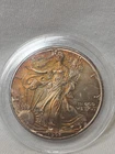 1997- 1 OZ. AMERICAN SILVER EAGLE- .999 FINE SILVER- TONING- NR AUCTION
