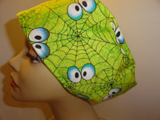 Ladies scrub hat, eyes and spider webs glow in the dark Vashon Halloween fun