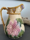 Ceramic majolica pitcher with floral design — photo 2