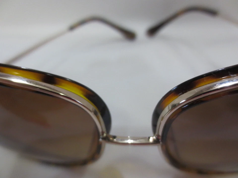 Franco Sarto女式棕色龟壳设计师椭圆形太阳镜 — 第 3/4 张图片