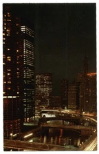 Chicago IL night time lapse Marina City river bridges unused vintage postcard